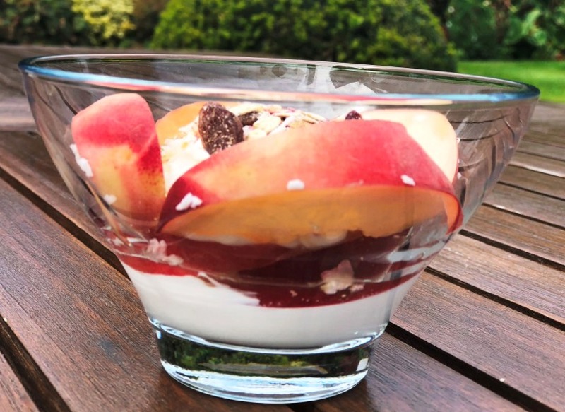Peach granola yoghurt with a coconut topping